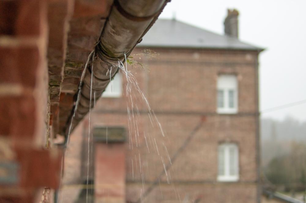 A,Gutter,On,A,Building,,An,Old,Drainpipe,Close up,,Water