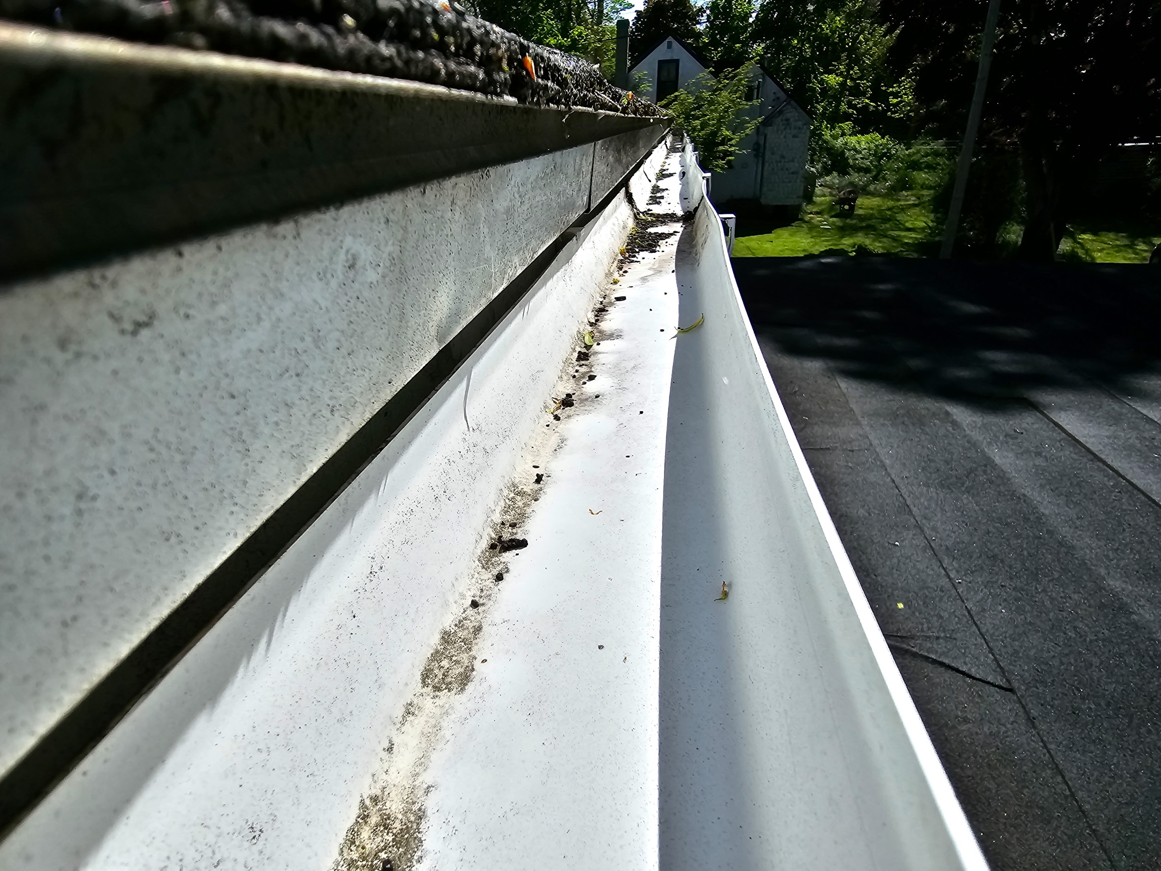 A,Long,View,Of,An,Old,Gutter,With,Bits,Of